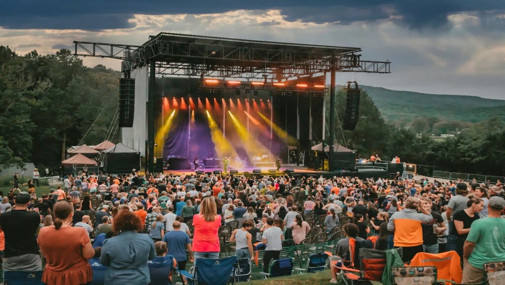 An image of an outdoor stage providing an example of the different stages and their costs.